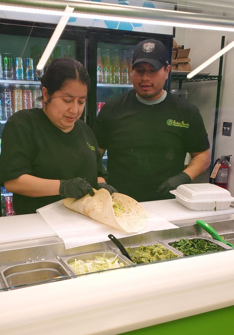 Brito's Burrito team member with final product